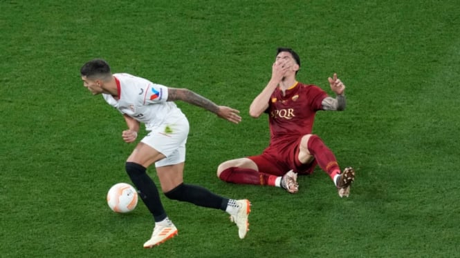 Erik Lamela dalam laga Sevilla vs AS Roma